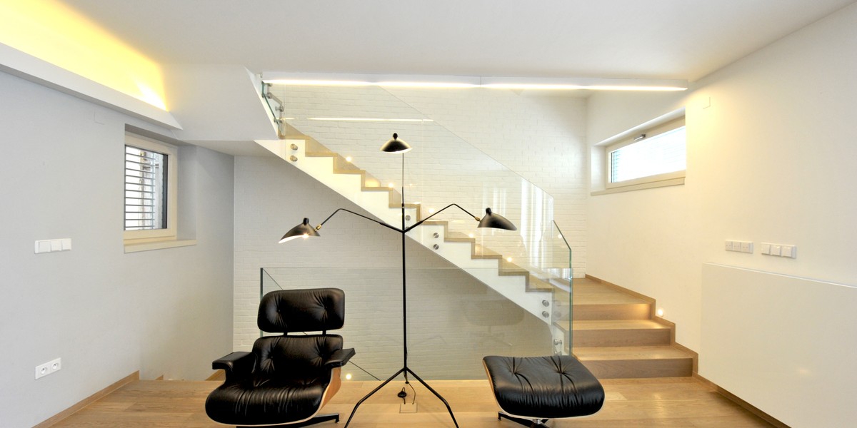 Living room with staircase.JPG